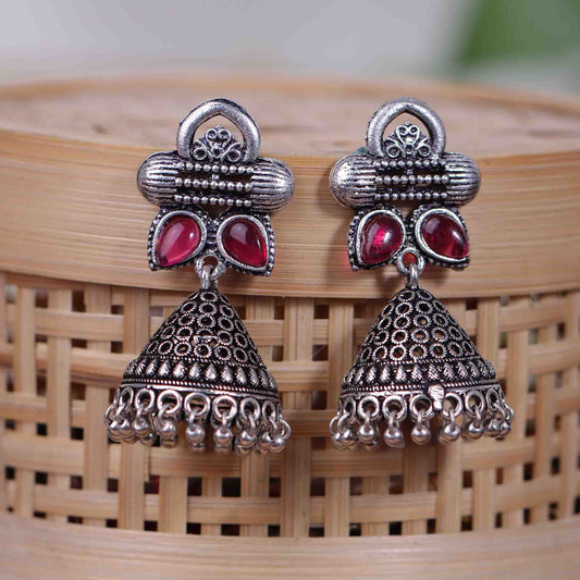 Red Stone Studded German Silver Earrings With Brass Jhumki