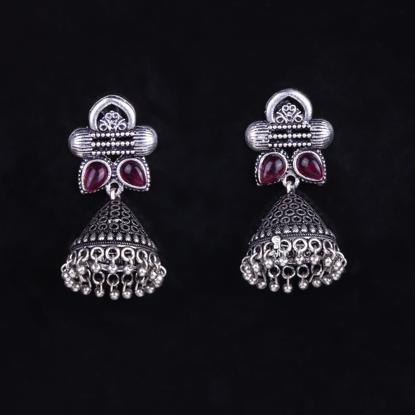 Red Stone Studded German Silver Earrings With Brass Jhumki