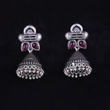 Red Stone Studded German Silver Earrings With Brass Jhumki