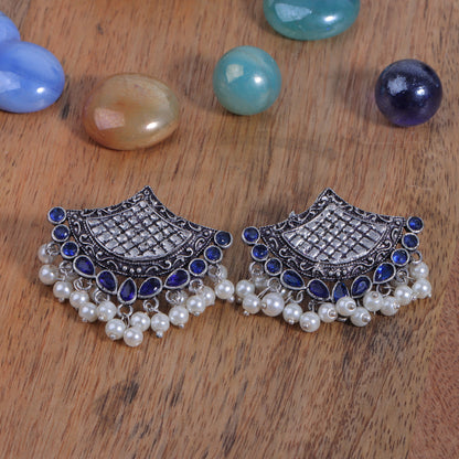 Blue Stone Studded Lotus Petal Shaped Oxidised Earrings With Hanging Line Of Pearl