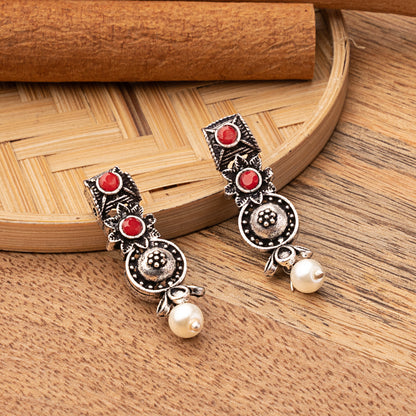 Dark Red Stone Studded Beautiful Oxidised Studs With Hanging Pearl