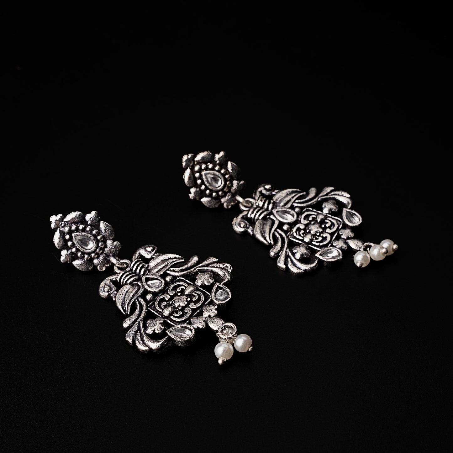 White Stone Studded Oxidised Earrings With Hanging Pearls