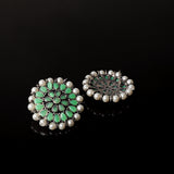 Pista Stone Studded Round Oxidised Studs With Embellished Pearls