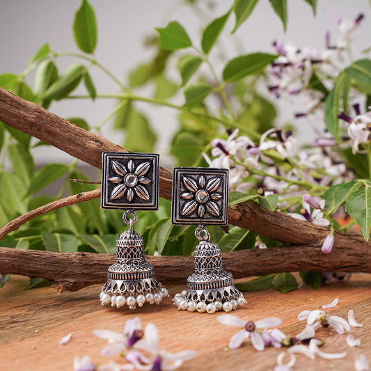 White Stone Studded Oxidised Earrings With Hanging Pearls