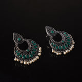 Green Stone Studded Oxidised Earrings With Hanging Pearls