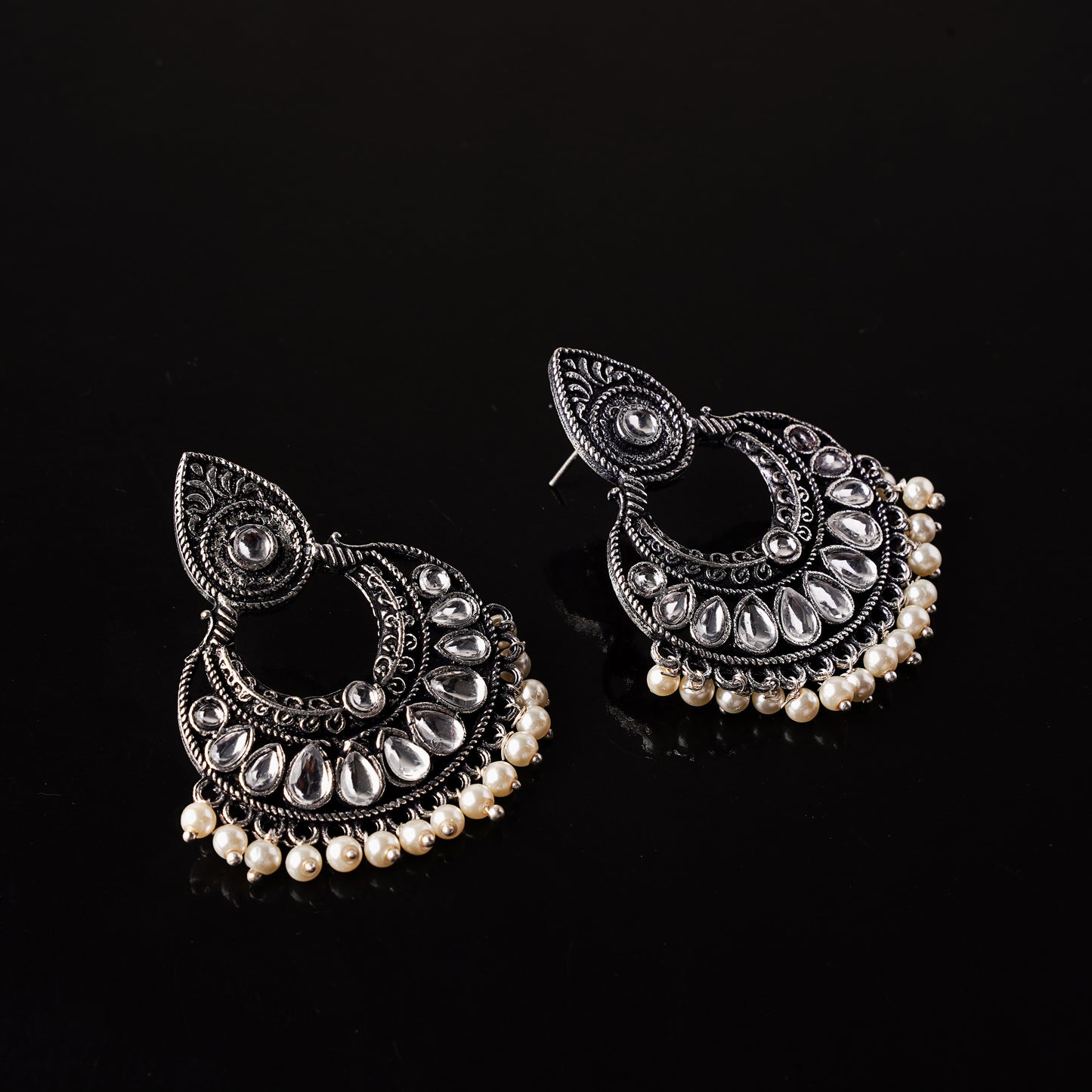 White Stone Studded Oxidised Earrings With Hanging Pearls