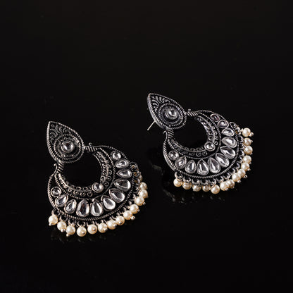 White Stone Studded Oxidised Earrings With Hanging Pearls