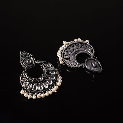 White Stone Studded Oxidised Earrings With Hanging Pearls