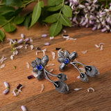 Blue Stone Studded Flower Shaped Intricate Oxidised Earrings