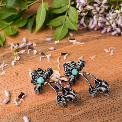 Mint Stone Studded Flower Shaped Intricate Oxidised Earrings