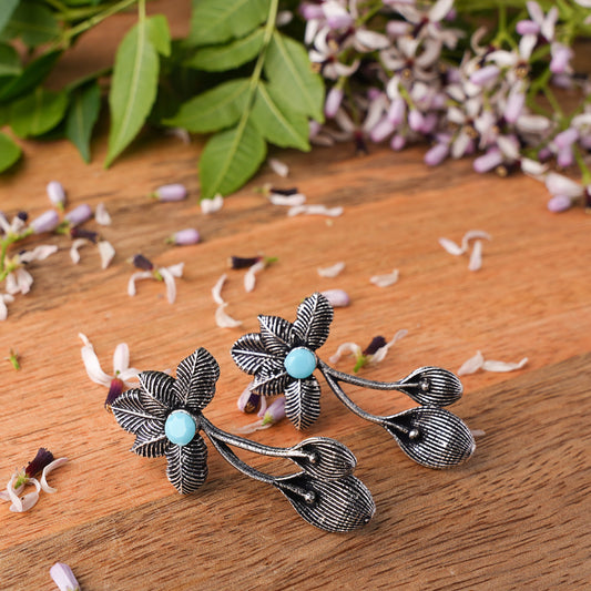 Sky Blue Stone Studded Flower Shaped Intricate Oxidised Earrings