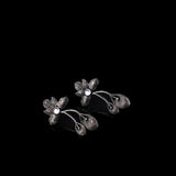 White Stone Studded Flower Shaped Intricate Oxidised Earrings