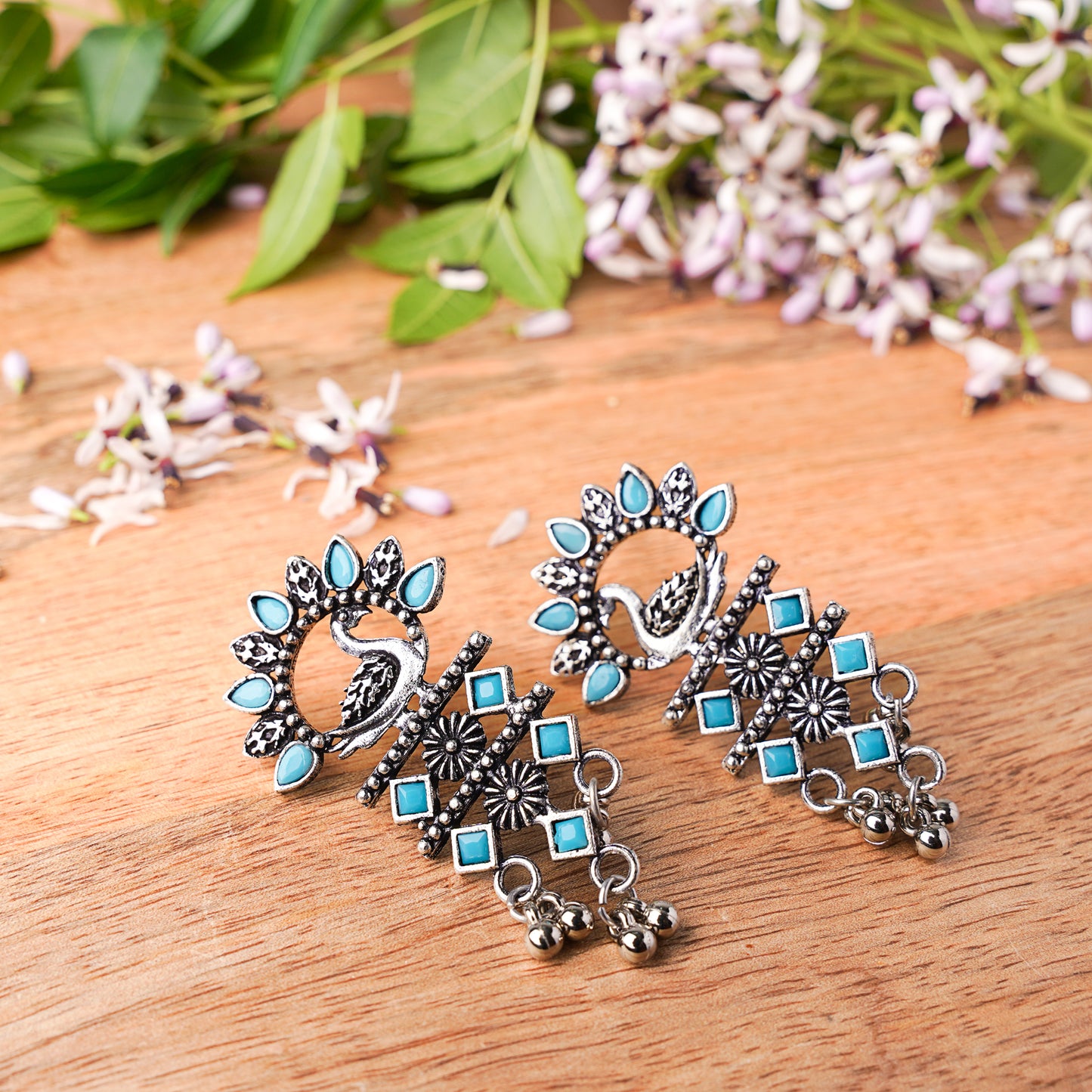 Sky Blue Stone Studded Peacock Motif Light Earrings