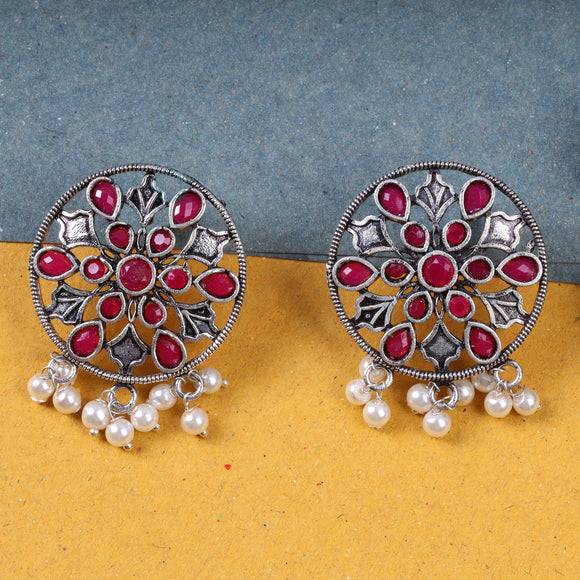 Red Stone Studded Circular Oxidised Earrings With Hanging Pearls