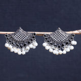 Black Stone Studded Lotus Petal Shaped Oxidised Earrings With Hanging Line Of Pearl