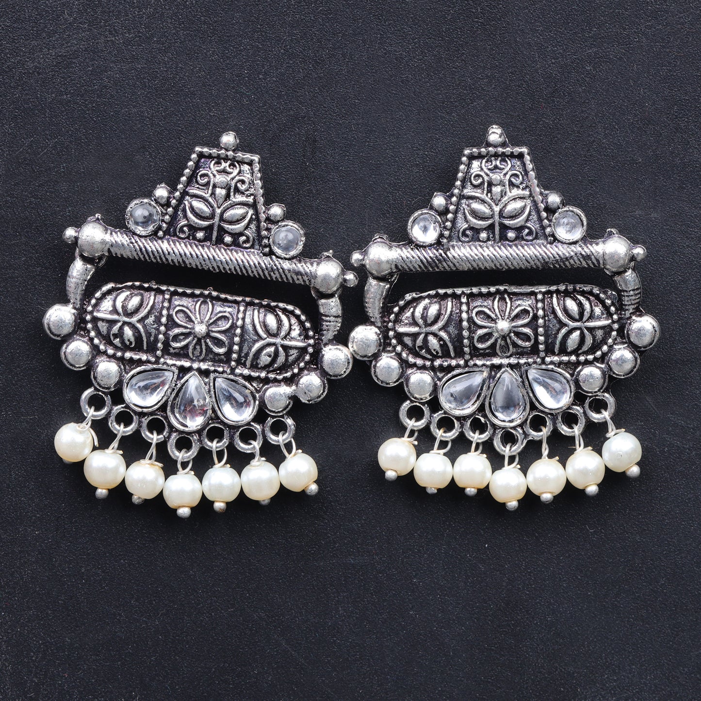 White Stone Studded Oxidised Earrings With Hanging Pearl