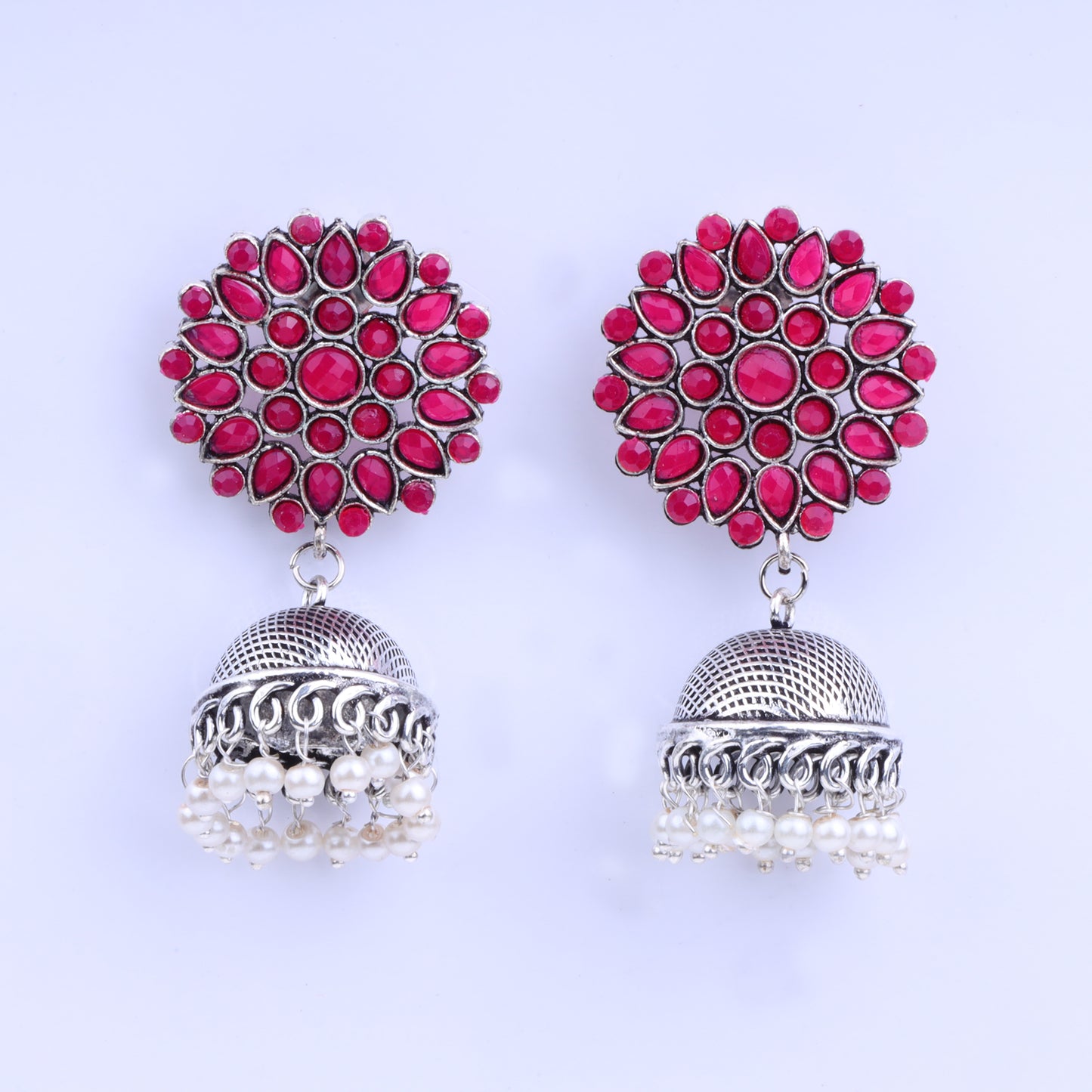 Red Stone Studded German Silver Statement Earrings With Brass Jhumki