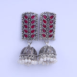 Red Stone Studded German Silver Statement Earrings With Brass Jhumki