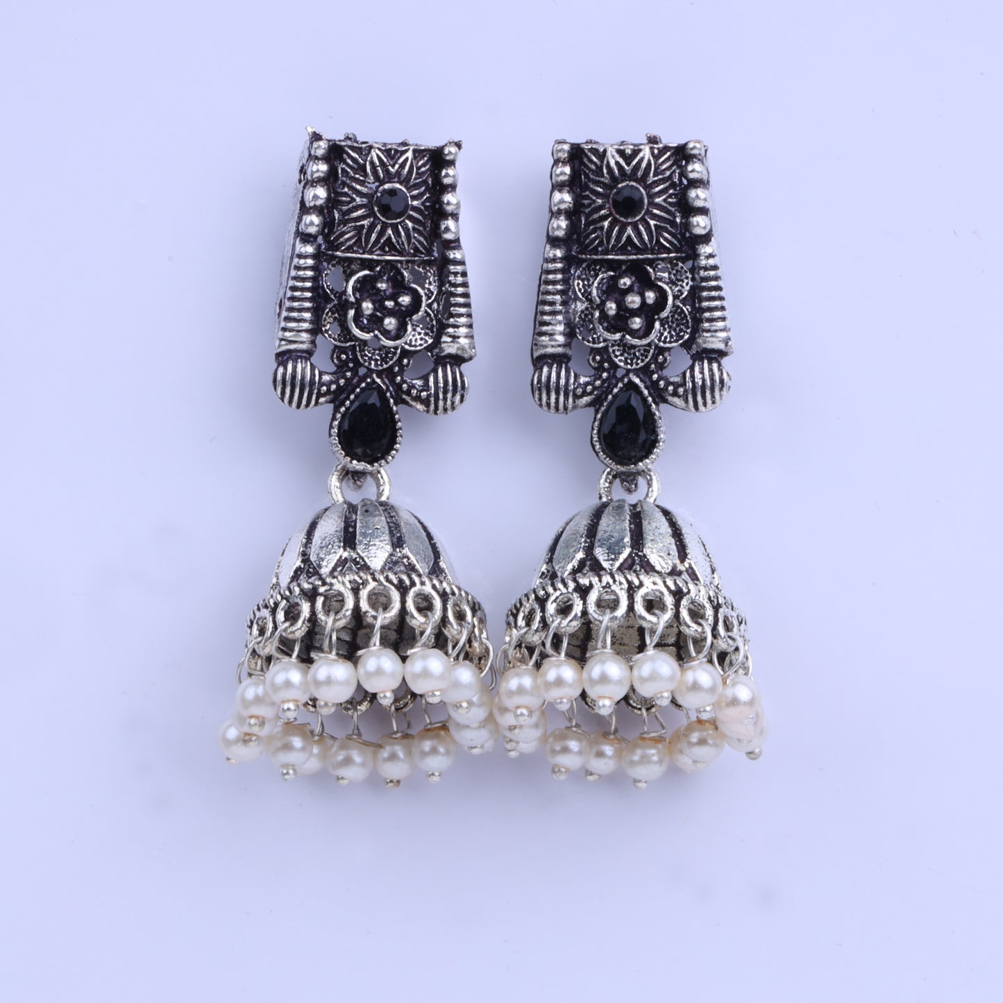 Black Stone Studded German Silver Earrings With Brass Jhumki