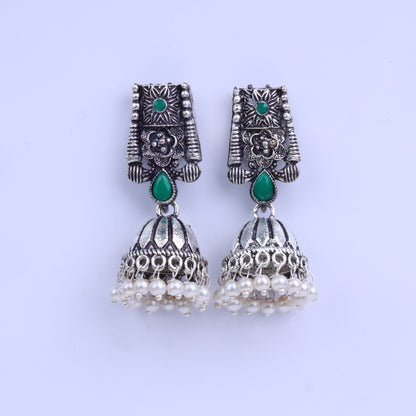 Green Stone Studded German Silver Earrings With Brass Jhumki