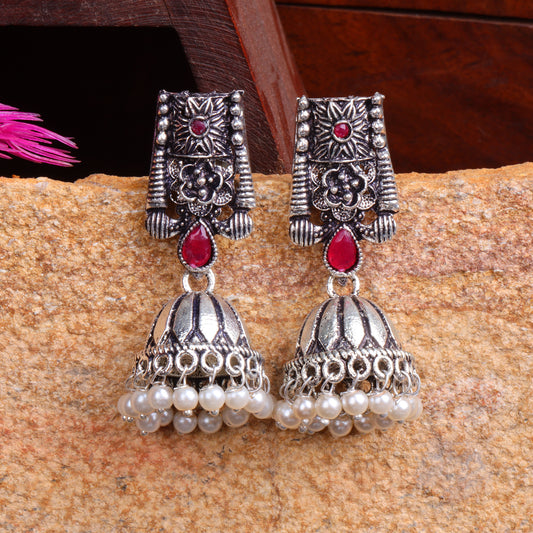 Red Stone Studded German Silver Earrings With Brass Jhumki