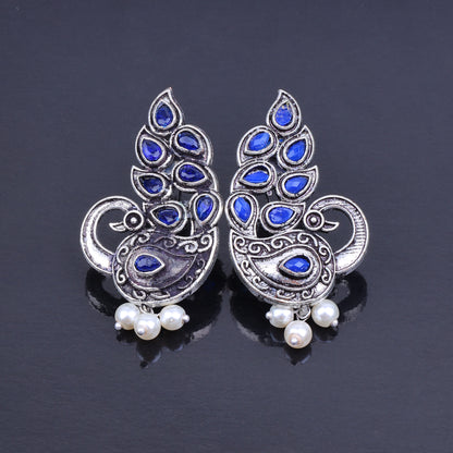 Blue Stone Studded Peacock German Silver Earrings With Hanging Pearls