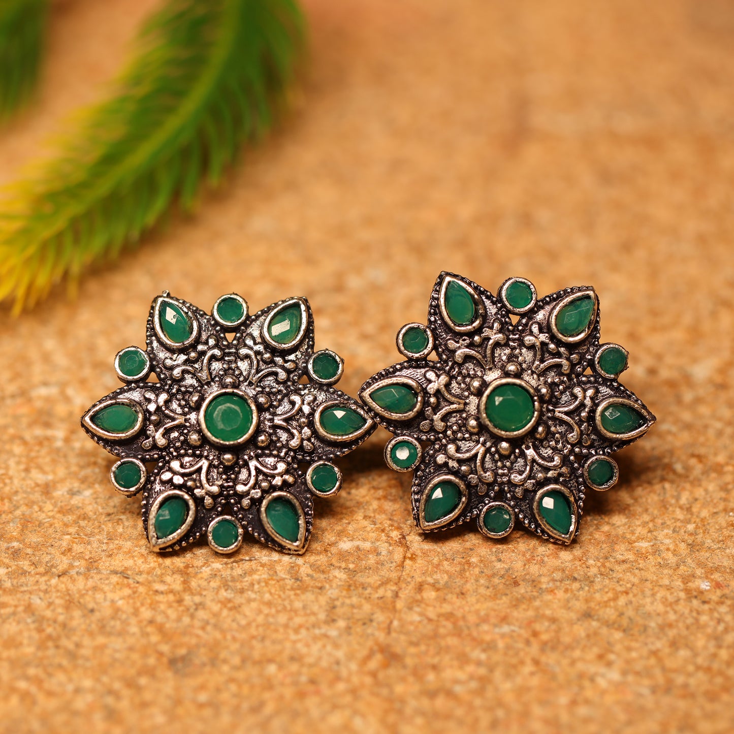 Green Stone Studded Star Shaped German Silver Stud Earrings