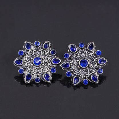 Blue Stone Studded Star Shaped German Silver Stud Earrings