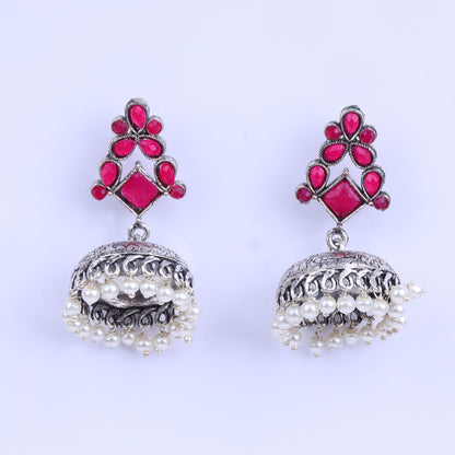 Red Stone Studded German Silver Dangler Earrings With Brass Jhumki