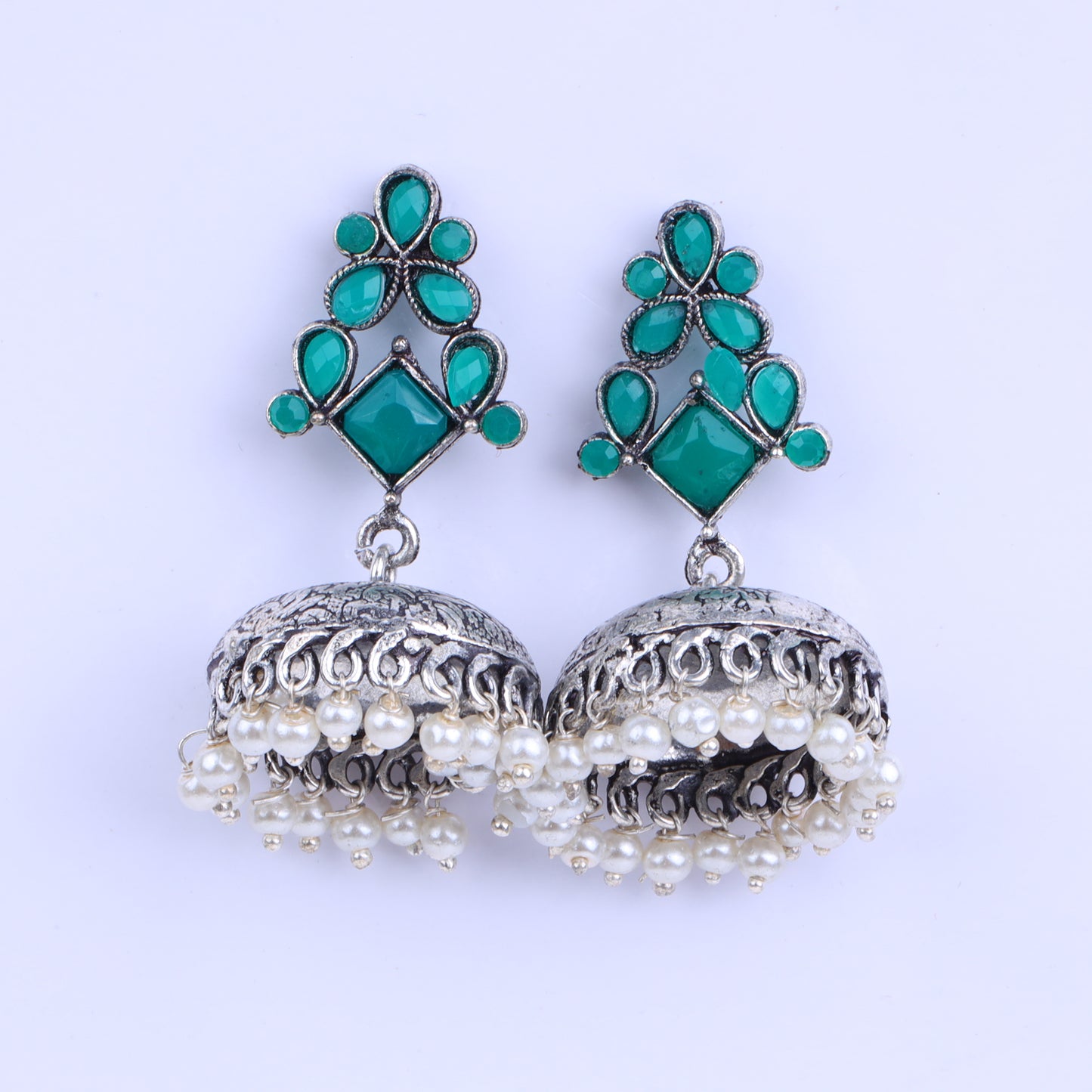 Green Stone Studded German Silver Dangler Earrings With Brass Jhumki